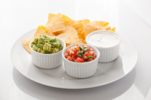 healthy tortilla chips, guacamole, salsa